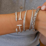 Silver Hammered Bangle with Floral Pattern