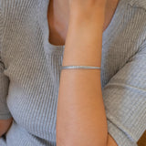 Silver Hammered Bangle with Floral Pattern