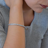Silver Hammered Bangle with Floral Pattern