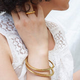 Gold Flat Oval Engraved Bangle