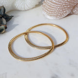 Gold Flat Oval Engraved Bangle