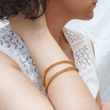 Gold Flat Oval Engraved Bangle