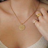 Gold Phaistos Disc Necklace