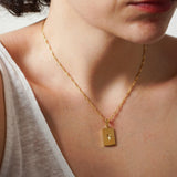 Χρυσό ορθογώνιο κολιέ με μενταγιόν ήλιου