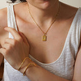 Χρυσό ορθογώνιο κολιέ με μενταγιόν ήλιου