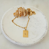 Χρυσό ορθογώνιο κολιέ με μενταγιόν ήλιου