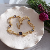 Gold Rectangular Chain Choker with Lines and Blue Enamel Connectors