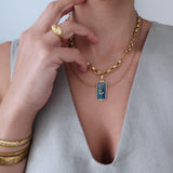 Thick Gold Stainless Steel Chain Collar Necklace with an Aegean Blue Pendant