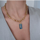 Thick Gold Stainless Steel Chain Collar Necklace with an Aegean Blue Pendant