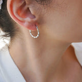 Silver hoop earrings wt engraved lines design