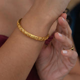 Gold Floral Perforated Bangle