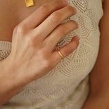 Tiny Gold Slim Band Pinky Pebble Ring