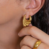 Large Gold Wavy Earrings