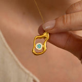 Gold Abstract EVIL EYE Necklace