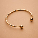 Gold Wire Bracelet with Ball Ends