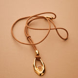 Gold Oval Pendant Cord Necklace