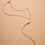 Gold Lariat Necklace with Geometric Tassel Motif