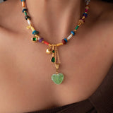 Χρυσό Κολιέ με Κοχύλια και Πράσινη Καρδιά