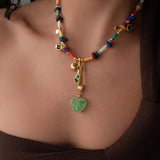 Χρυσό Κολιέ με Κοχύλια και Πράσινη Καρδιά